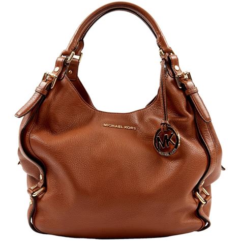 are mk bags real leather.